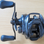 Daiwa TATULA 300 TTU300HSL Baitcast Reel LH Black Unused Open Box - MagsTag