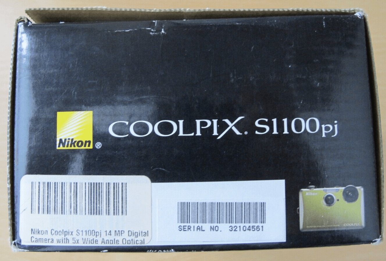 Nikon Coolpix S1100pj 14 MP Digital Camera with 5x Wide Angle built - in projector - MagsTag