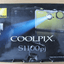Nikon Coolpix S1100pj 14 MP Digital Camera with 5x Wide Angle built - in projector - MagsTag