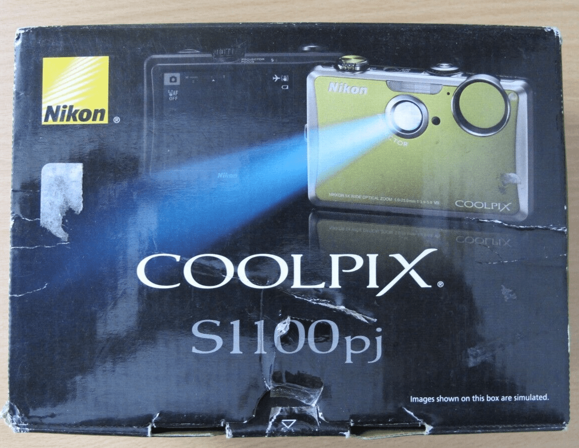 Nikon Coolpix S1100pj 14 MP Digital Camera with 5x Wide Angle built - in projector - MagsTag