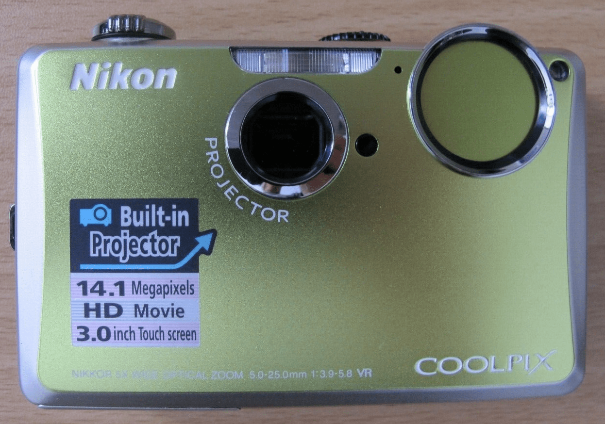 Nikon Coolpix S1100pj 14 MP Digital Camera with 5x Wide Angle built - in projector - MagsTag