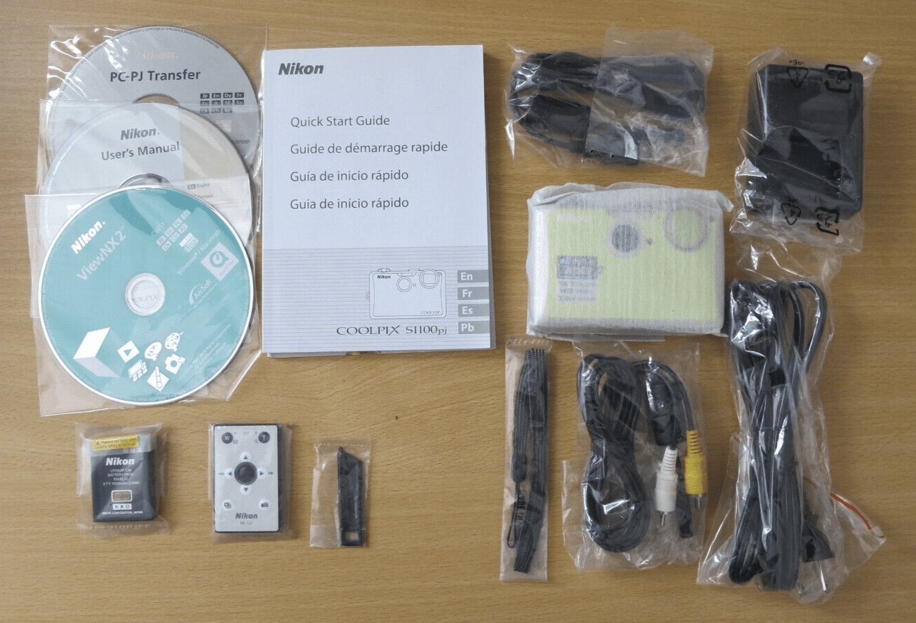 Nikon Coolpix S1100pj 14 MP Digital Camera with 5x Wide Angle built - in projector - MagsTag