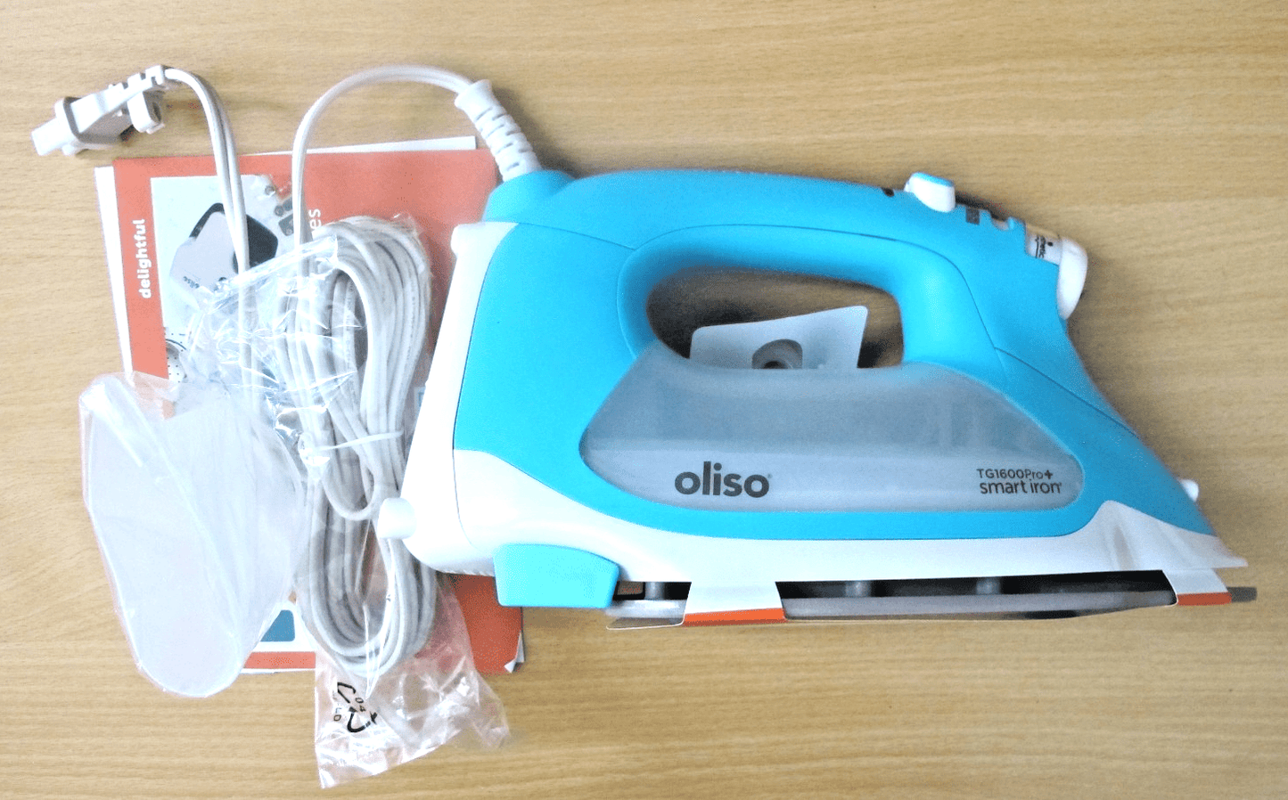 Oliso TG1600 ProPlus Smart Iron with Auto-Lift 1800 Watt Steam Iron Clothes - MagsTag