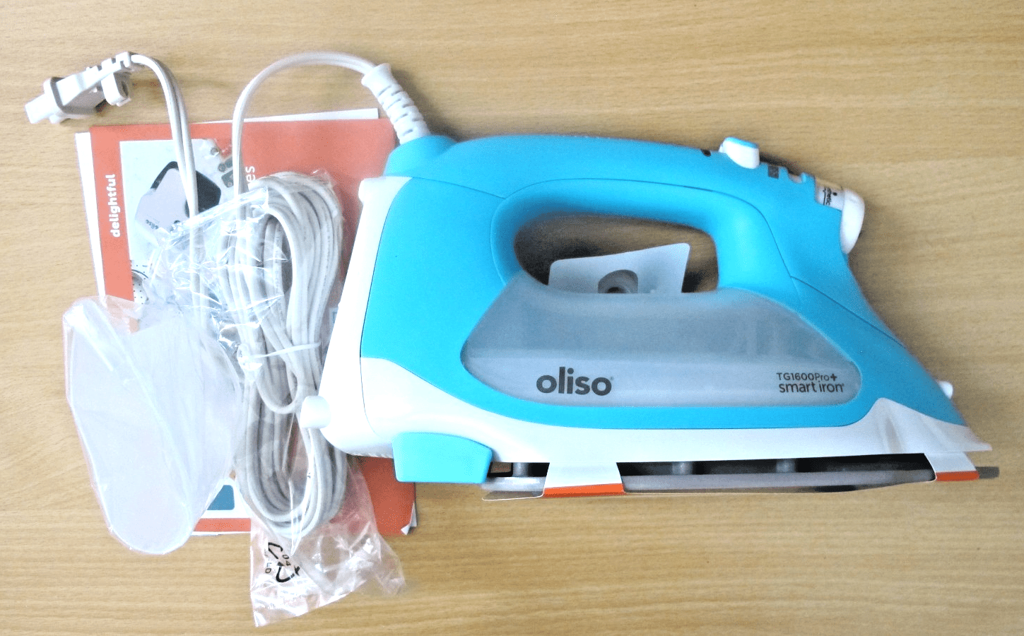 Oliso TG1600 ProPlus Smart Iron with Auto-Lift 1800 Watt Steam Iron Clothes - MagsTag